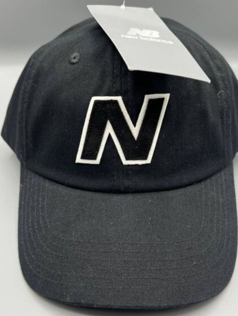New Balance Kids Black Baseball Cap with White-Outlined 'N' Size Xl